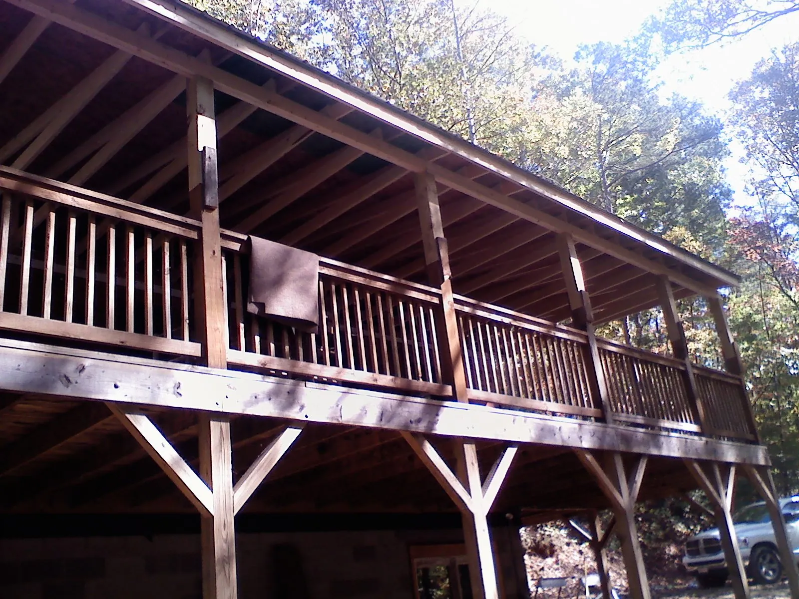 Timber framing under a new elevated porch and deck — Roof Leak Repair in Mitchellville by Roofing Brothers
